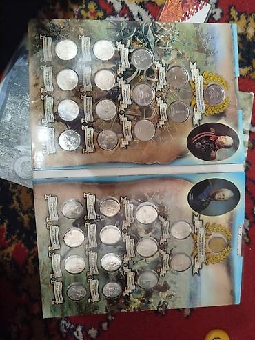 Монеты: Коллекция монет и банкнот России Состав: - Альбом «Памятные монеты — 9