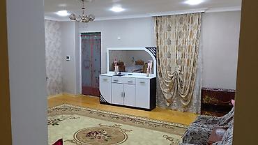 binede: 3 otaqlı, 100 kv. m, Orta təmir — 2