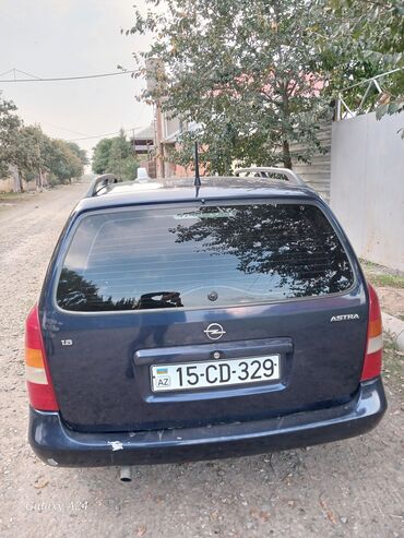 Opel: Opel Astra Caravan – ECOTEC benzin mühərriki və avtomat ötürücü — 10