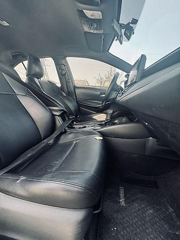byd e1: Toyota Corolla: 2023 г., 1.8 л, Вариатор, Гибрид, Седан — 9