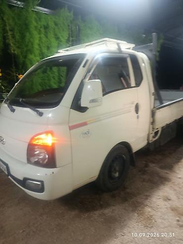 h 100: Hyundai Porter (грузовой бортовой малотоннажник) - Компоновка: кабина — 1