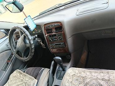 Унаа сатуу: Toyota Carina E: 1999 г., 1.8 л, Кол менен иштөөчү, Бензин, Седан — 8