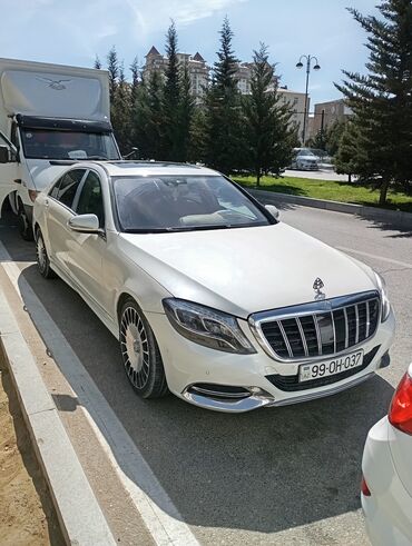 Mercedes-Benz: Ağ rəngdə olan Mercedes-Maybach sedanı. Avtomobil rahat və dəbdəbəli lalafo.az -da Mercedes-Benz: Ağ rəngdə olan Mercedes-Maybach sedanı. Avtomobil rahat və dəbdəbəli