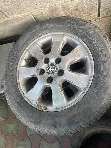 динам: Комплект автомобильных колес и шин. Состав: - Литые диски Toyota — 1