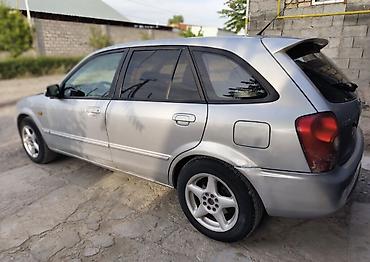 Mazda: Mazda Familia: 2004 г., 2 л, Кол менен иштөөчү, Газ, Хетчбек — 5