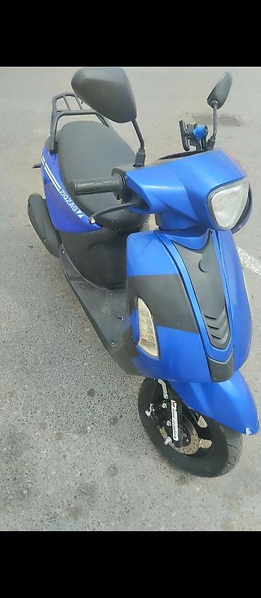 zigzag one 50cc blue: Skuter – ZigZag, mavi rəng - Şəhərdaxili rahat hərəkət üçün kompakt — 1