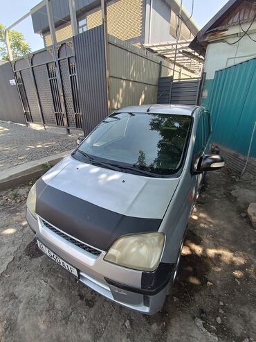 автомобиль на кредит: Daihatsu Cuore: 2004 г., 1 л, Бензин