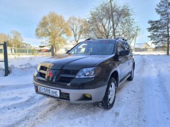 возможен обмен на дом: Mitsubishi Outlander: 2004 г., 2.4 л, Механика, Бензин, Кроссовер