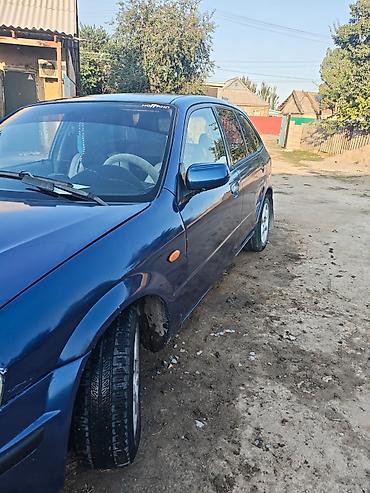 х трейл: Mazda Familia: 2000 г., 1.5 л, Механика, Бензин, Хэтчбэк — 2