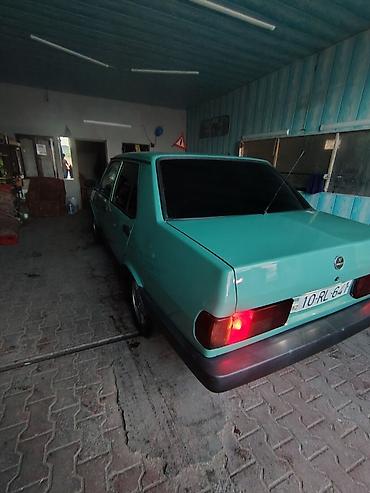 Tofas: Model: Tofaş Şahin (sedan) Kuzov: 4 qapılı, açıq yaşıl rəng Yanacaq — 5