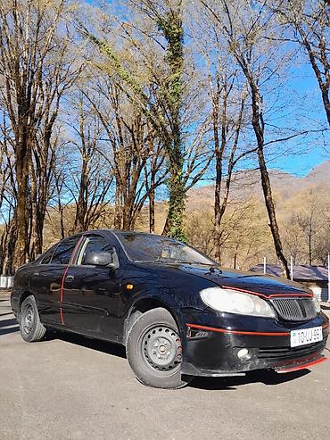 chevrolet aveo oluxana: Nissan Sunny sedan – qara rəng, 4 qapı, ön-çəkiş. Xüsusiyyətlər: - — 4