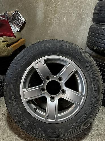 275 45 20: Teker disk ela veziyyetde az surulub zavod Chevrolet nivanin usdunde — 1