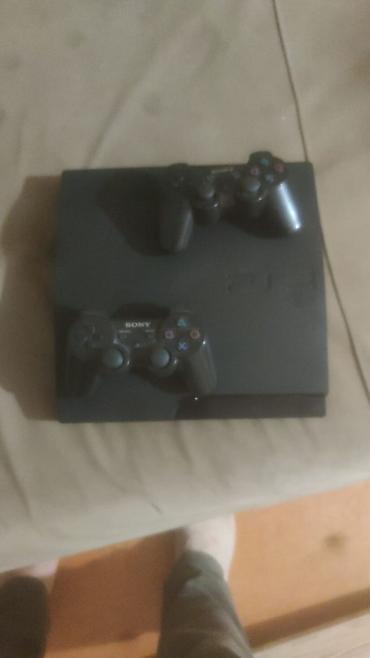 ps3 islenmis: Sony PlayStation 3 (PS3) Slim oyun konsolu + sarj kabeli — 1