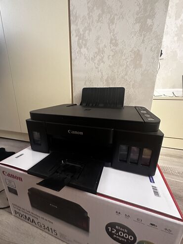 Printerlər: Canon PIXMA G3415 1 ay islenilib Kraskasi gutusu ustunde Razilasma