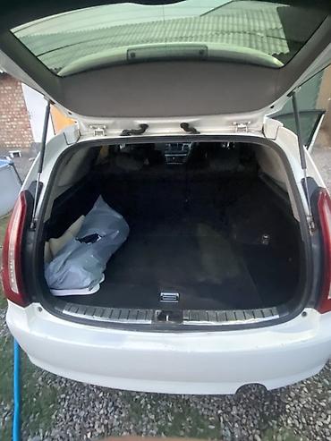 devo matiz: Toyota Qualis: 2004 г., 2 л, Автомат, Бензин, Универсал — 5