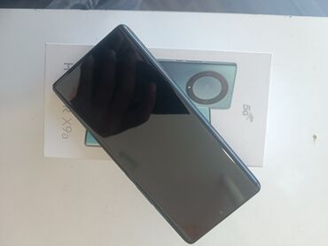 telefon qusar: Honor X9a, 128 GB, rəng - Mavi, Barmaq izi, Face ID