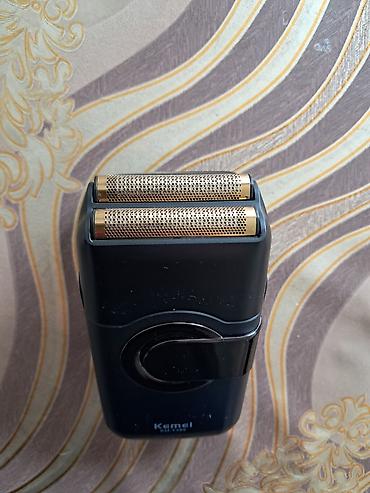 akumulator satisi: Kemei KM-T389 elektrik ülgüc iki ağızlı üz qırxan,alınıb hec — 2