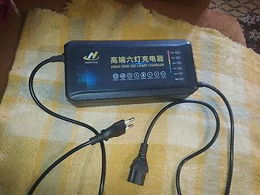 ucuz noutbuk: Elektrikli velosiped üçün adapter (48V 12Ah) Xüsusiyyətlər: - 220V — 2