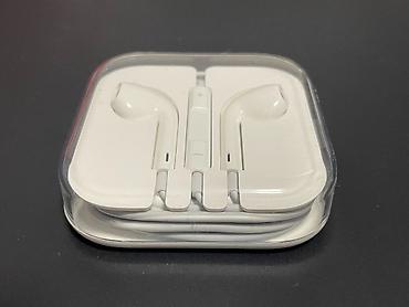 strange things: Original Apple earphones/earpads, wired + + 2 charging adapters with — 2