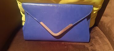 plava pismo torbica osatenadimenzijeduzinacm: Plava pismo tašna, u dobrom stanju. Moguće lično preuzimanje u