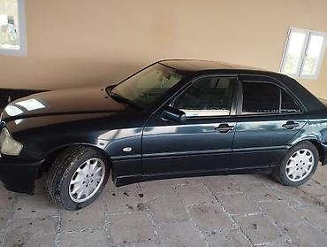 disk 14: Mercedes-Benz C 200: 2 l | 1999 il Sedan — 5