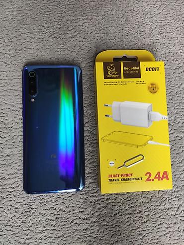 mi 9 plata: Xiaomi Mi 9, 64 GB, rəng - Mavi, 
 Sensor, Barmaq izi, Simsiz şarj — 2