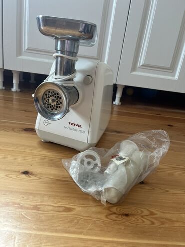 Plitələr və bişirmə panelləri: Ət çəkən maşın Tefal