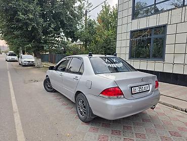 тюнинг гольф 3: Mitsubishi Lancer: 2003 г., 1.6 л, Механика, Бензин, Седан — 4