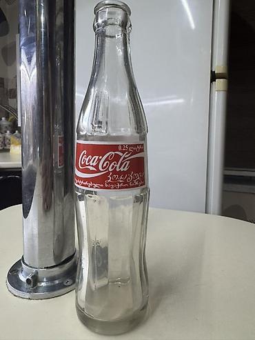 gürcü xengeli: Məhsul: Şüşə Coca‑Cola butulkası Təsvir: - Həcm: 0.25 L (etiketdə — 6