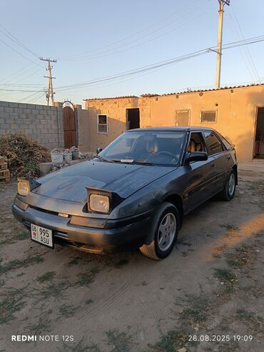 Mazda: Mazda 323: 1991 г., 1.6 л, Механика, Бензин, Хэтчбэк — 3
