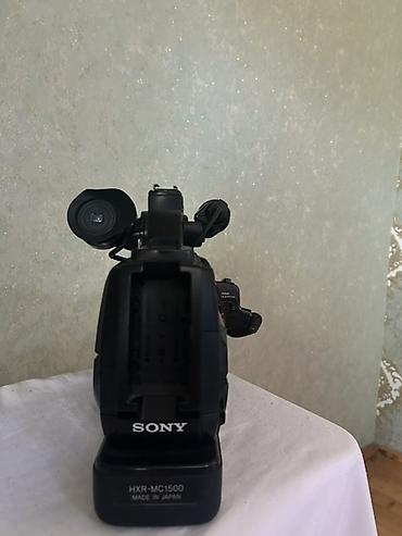 sit ustu monitor: Sony HXR-MC1500 peşəkar videokamera - Sensor və görüntü: Exmor R — 2