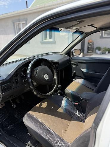 e34 4 4: Daewoo Nexia: 2011 г., 1.5 л, Механика, Бензин, Седан — 3
