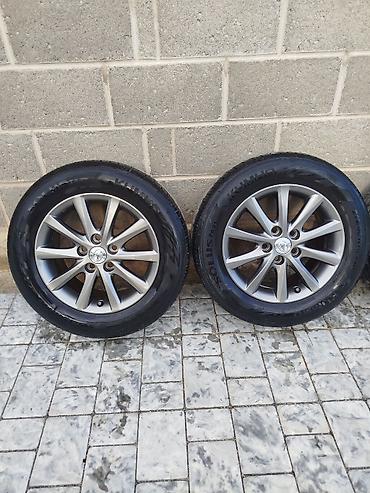 205 65 16 с: Комплект из 4 колес Toyota: оригинальные литые диски + шины. - Диски — 2