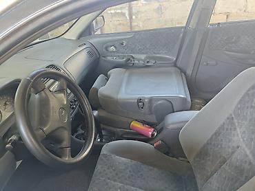 m5 e60 v10: Mazda 323: 2000 г., 1.6 л, Автомат, Бензин, Хэтчбэк — 3
