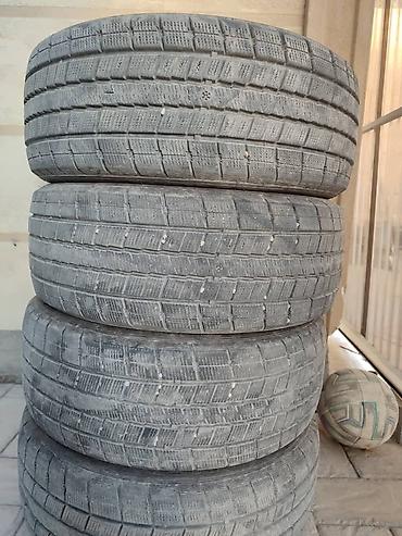 шина размер 17 55 215: Зимние бескамерные шины, комплект из 4 шт. - Тип: radial tubeless — 2