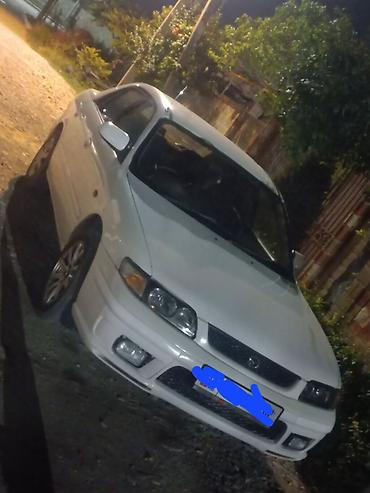 Mazda Capella: 1998 г., 1.8 л, Автомат, Газ, Седан lalafo.kg да Mazda Capella: 1998 г., 1.8 л, Автомат, Газ, Седан