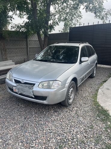 peugeot машина: Mazda 323: 1999 г., 1.5 л, Автомат, Бензин, Универсал