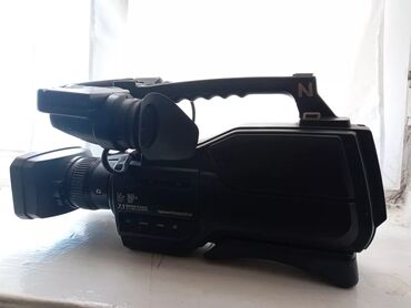 Videokameralar: Peşəkar video kamera - HD çəkiliş imkanı olan çiyinüstü tip video — 10