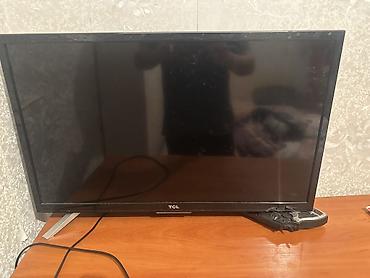 acer aspire 7: Телевизор TCL, диагональ около 24–28". Компактная модель для кухни — 1