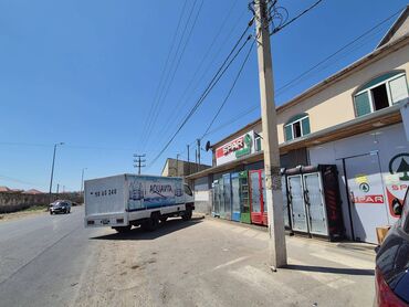 Kommersiya daşınmaz əmlakının satışı: Məhəmmədi ərazisi, Qoşqaroğlu avtoservisin yaxınlığı, əsas yolun — 24