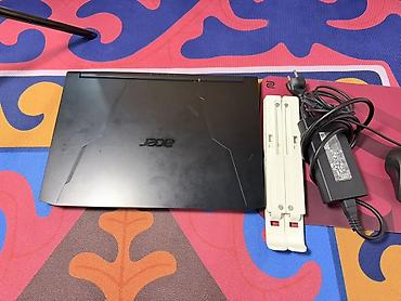 Ноутбуки Acer: Игровой ноутбук Acer в черном корпусе с красной подсветкой клавиатуры — 5