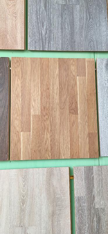 laminant: Məhsul: Laminat döşəmə panelləri – müxtəlif ağac teksturaları və rəng — 1