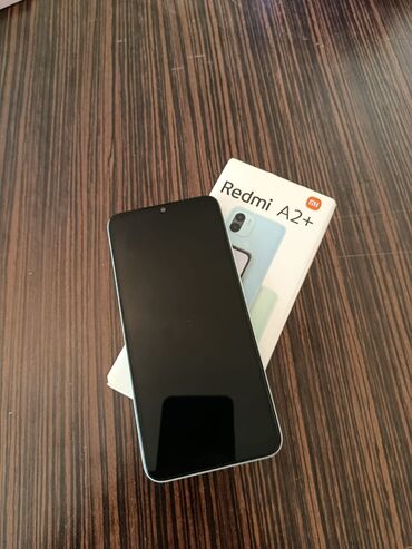 telefon redmi: Xiaomi Redmi A2+ modeli, açıq mavi rəngli korpusu ilə istifadəçilərə