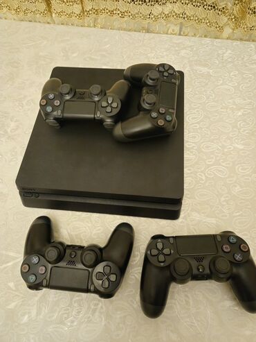 PS4 (Sony Playstation 4): Sony PlayStation 4 slim 1Tb heç bir problemi yoxdur, üzərində 4 yeni