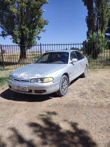 меняю дом на авто: Mazda Cronos: 1992 г., 2 л, Механика, Бензин, Седан