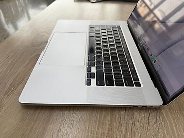 Ноутбуки Apple (MacBook): Apple MacBook Pro 16" (серебристый) - Экран 16 дюймов Retina, тонкие — 7
