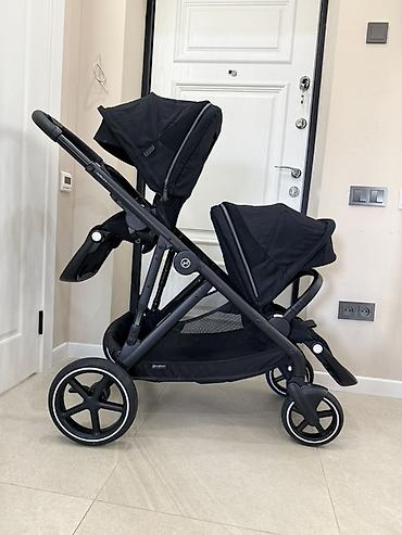 Детская коляска для двоих детей Cybex Gazelle S — черная, модульная