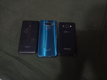 купить ноутбук hp pavilion g7: Смартфоны разных моделей. Один из них — LG с тройной камерой и синим