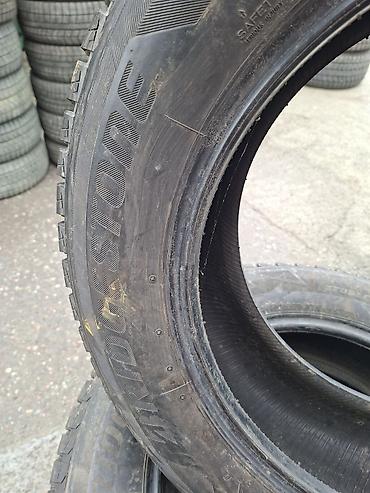 Шины: Bridgestone Blizzak DM‑V2 — комплект зимних шин без шипов. - Размер — 3