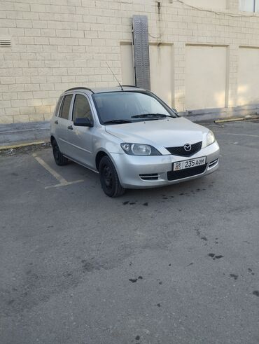 Mazda: Mazda Demio: 2003 г., 1.4 л, Механика, Бензин